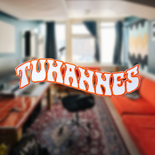 Tuhannes - Haalarimerkki
